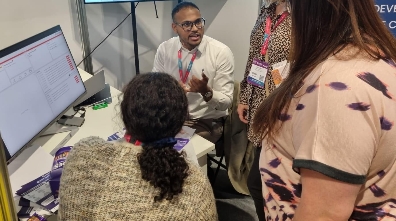 Gajandran Srikanthan, Co-Founder of Artivis, presenting to home care providers at The Care Show, Birmingham